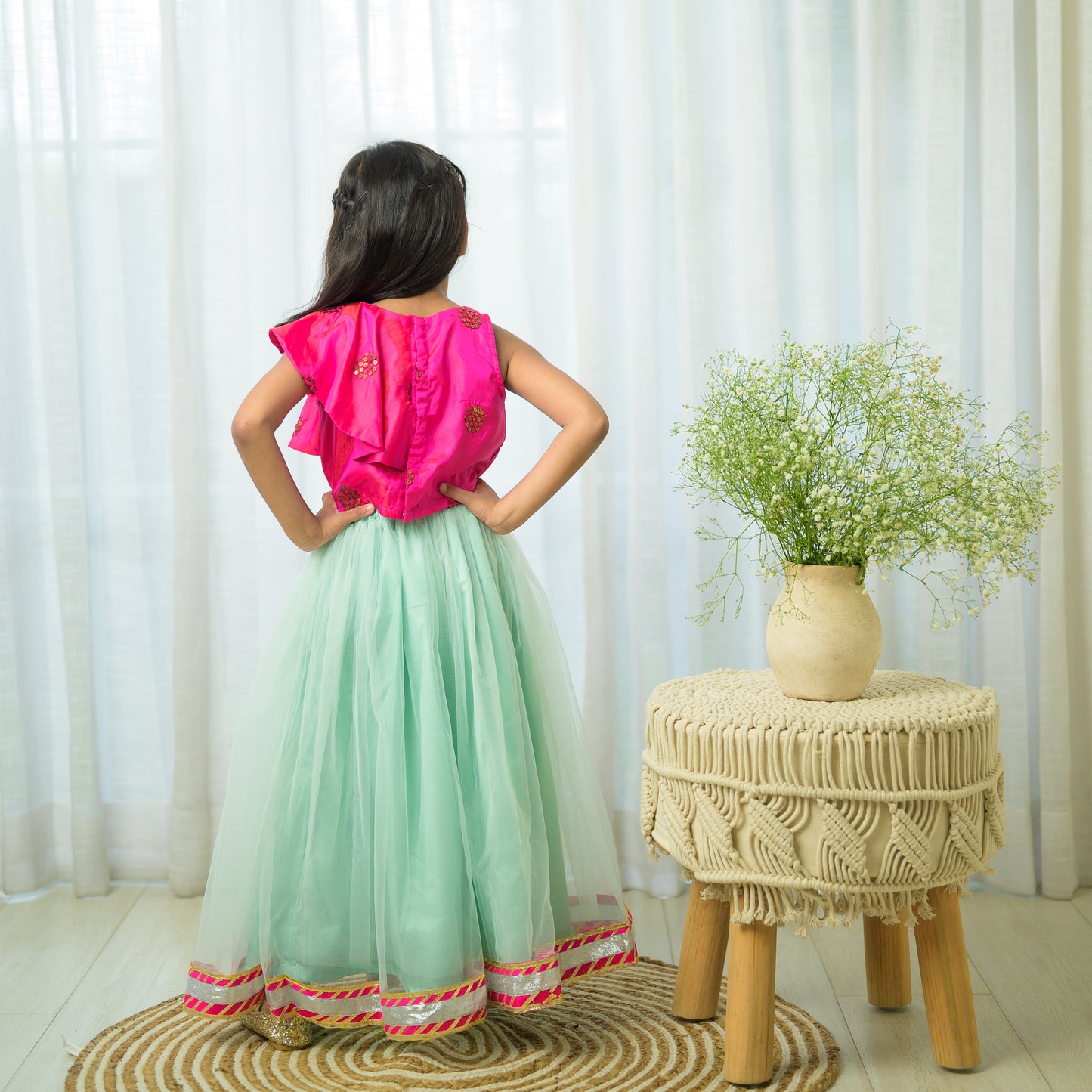 Hot Pink Ruffled Top With Green Net Lehenga