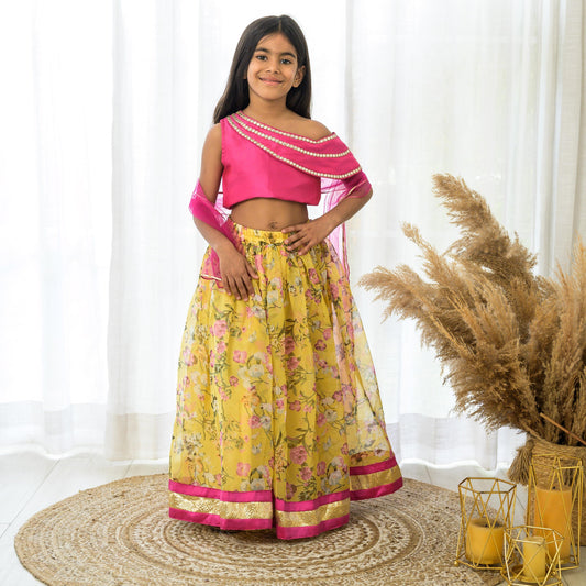 Yellow Organza lehenga with Pink Offshoulder