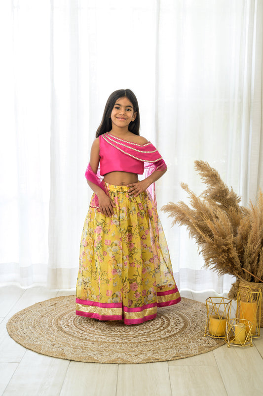 Yellow Organza lehenga with Pink Offshoulder